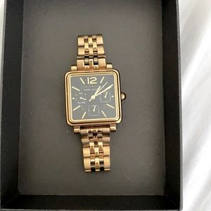 Marc Jacobs gold watch with black face